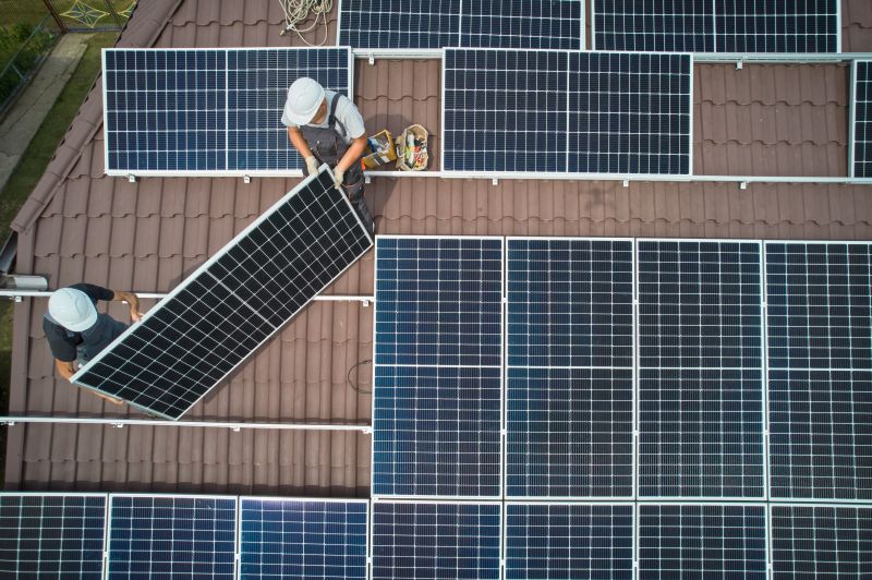 Experienced technicians working on solar panels